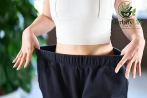 Woman checking her waist size during weight loss journey